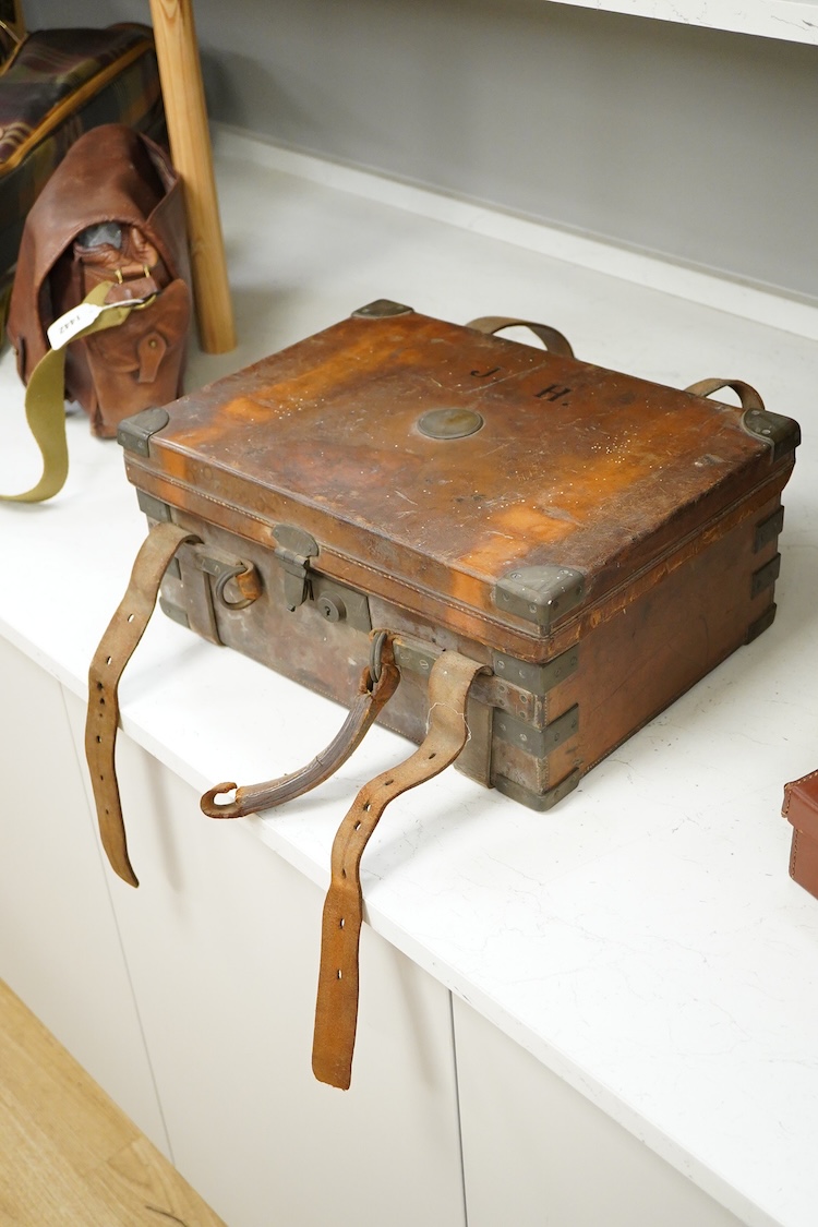 Two late 19th century brown leather magazine cases and another ‘collars’ box, largest 41cm wide